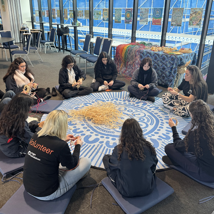 EPIC's Sydney team sitting around in a yarning circle.